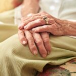Hands resting gently, symbolizing prayer